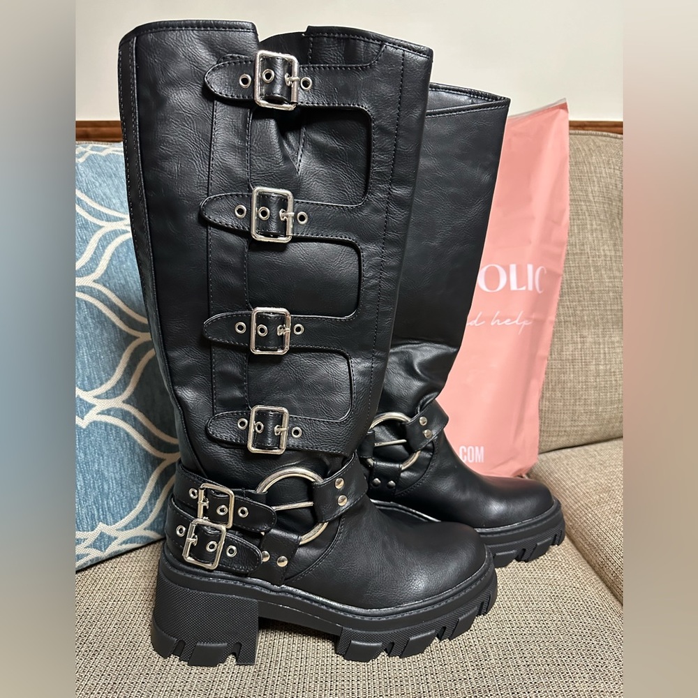 Chunky on trend, just below knee moto boot with silver buckle detail. 😍